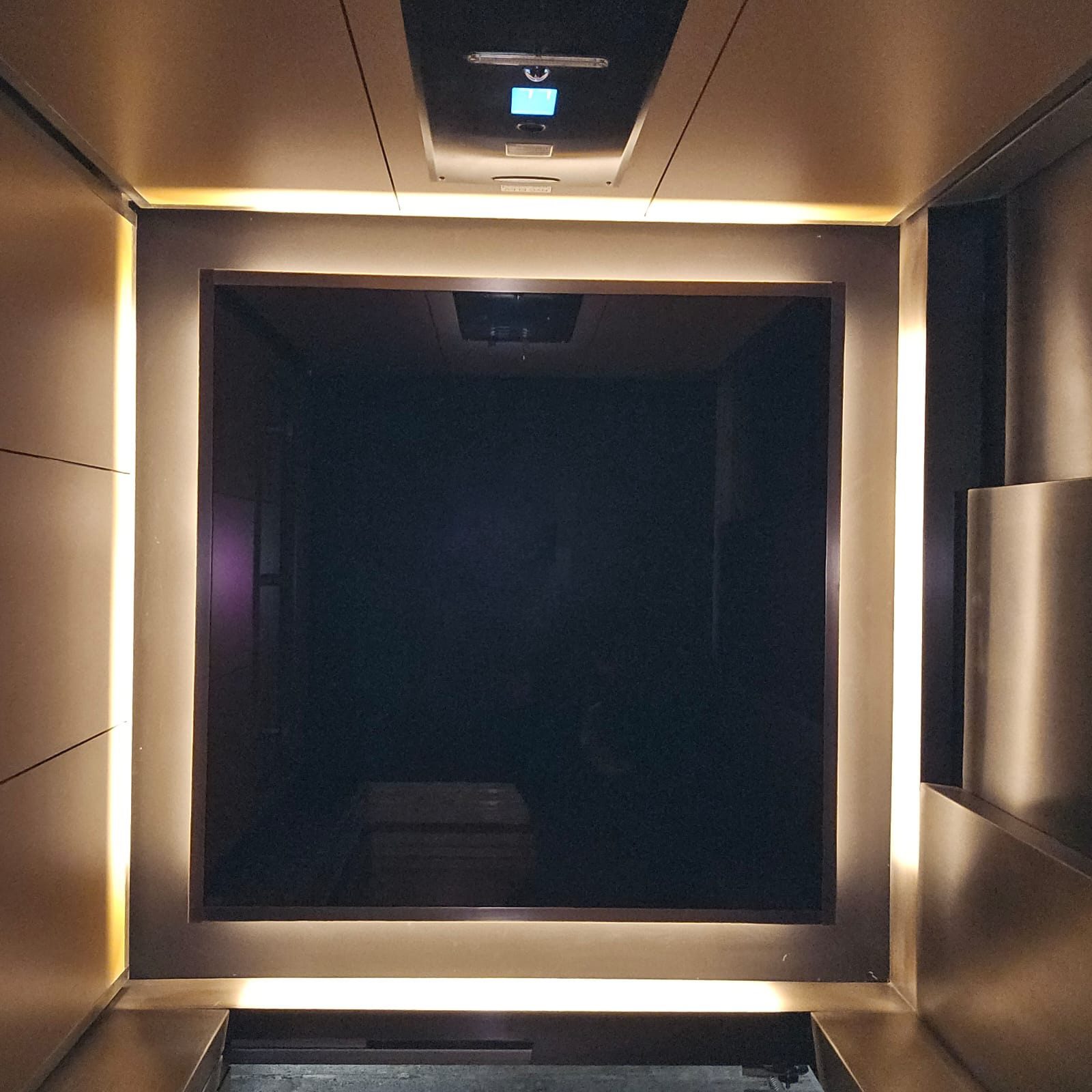 Bronze Glass Elevator Cab Renovation in SoHo — 130 Prince Street · SoHo, Manhattan